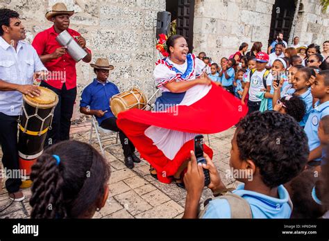 What is Dominican music called, and how does it dance through the cultural veins of the Caribbean?